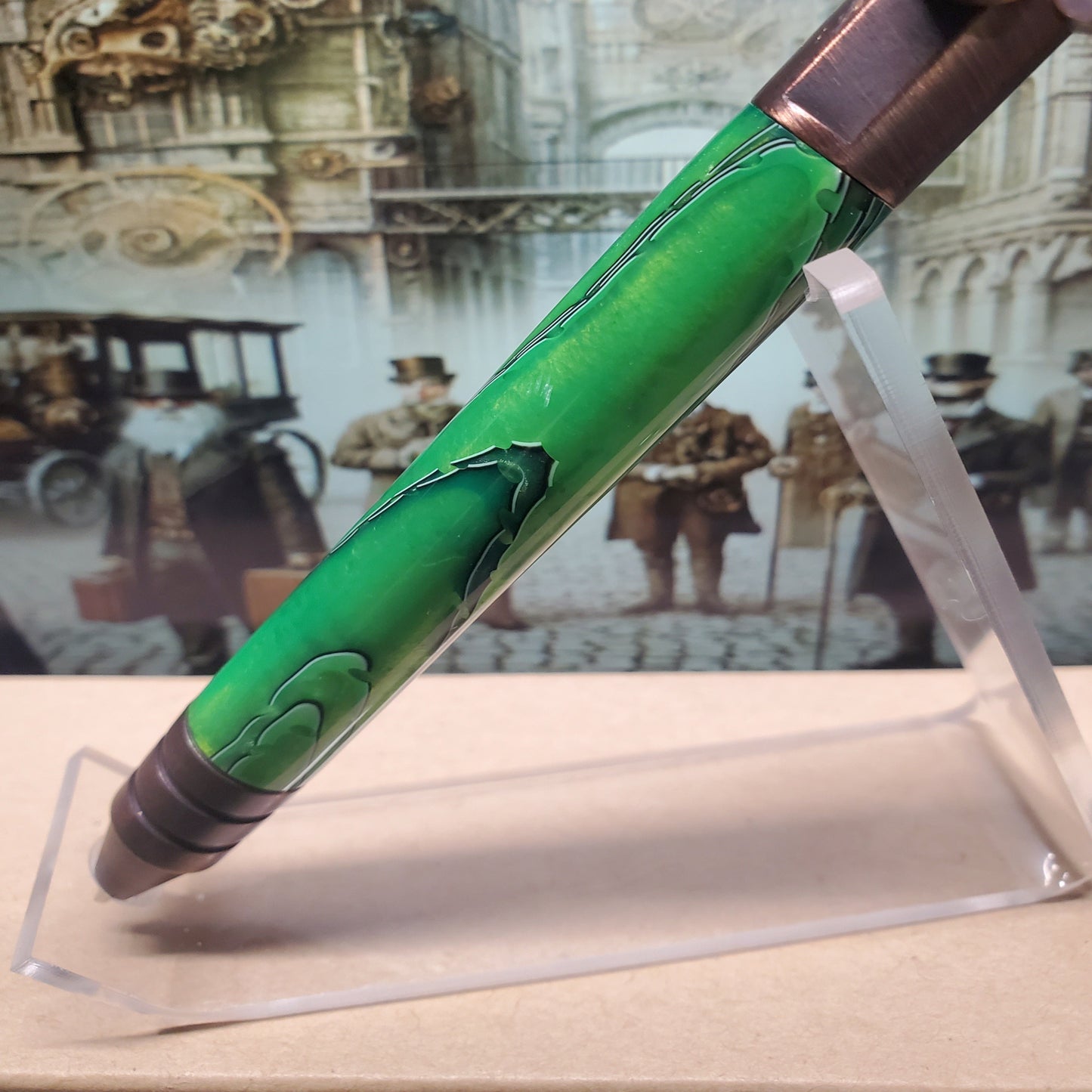 Closeup of green acrylic portion of Steampunk writing pen