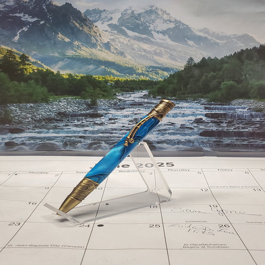 Decorative Flyfishing Writing Pen featuring antique brass settings with blue acrylic material