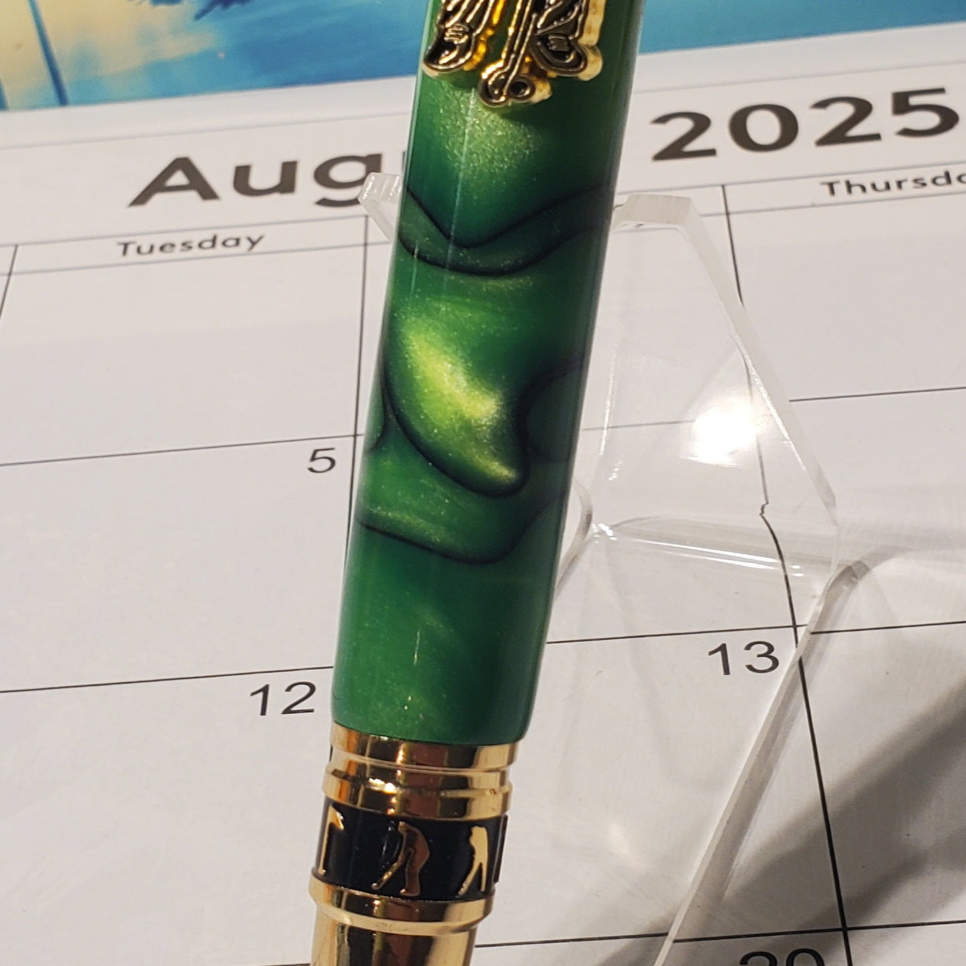 close-up of the green acrylic material that is part of the Golf writing pen