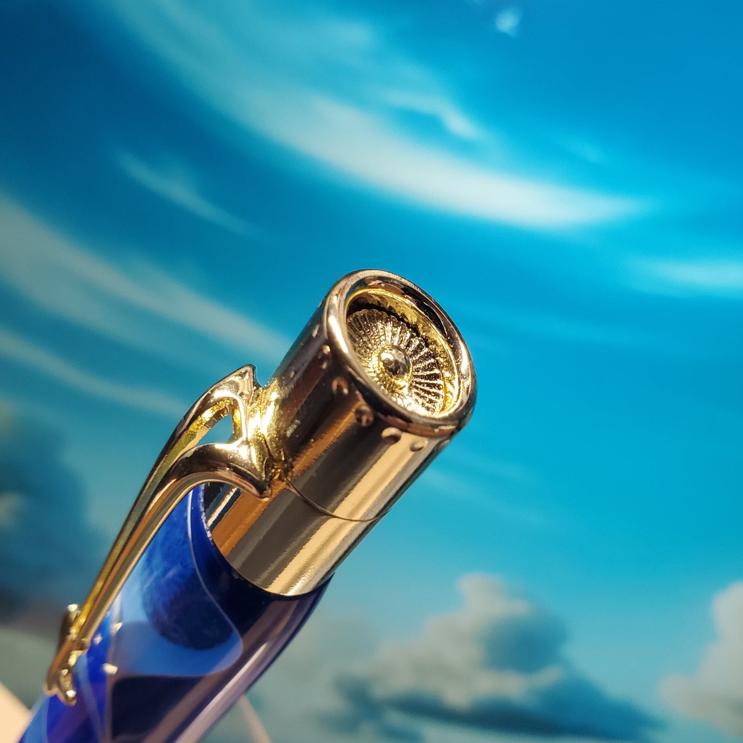 Close-up of the top of the Jetliner pen designed to look like a jet engine turbine